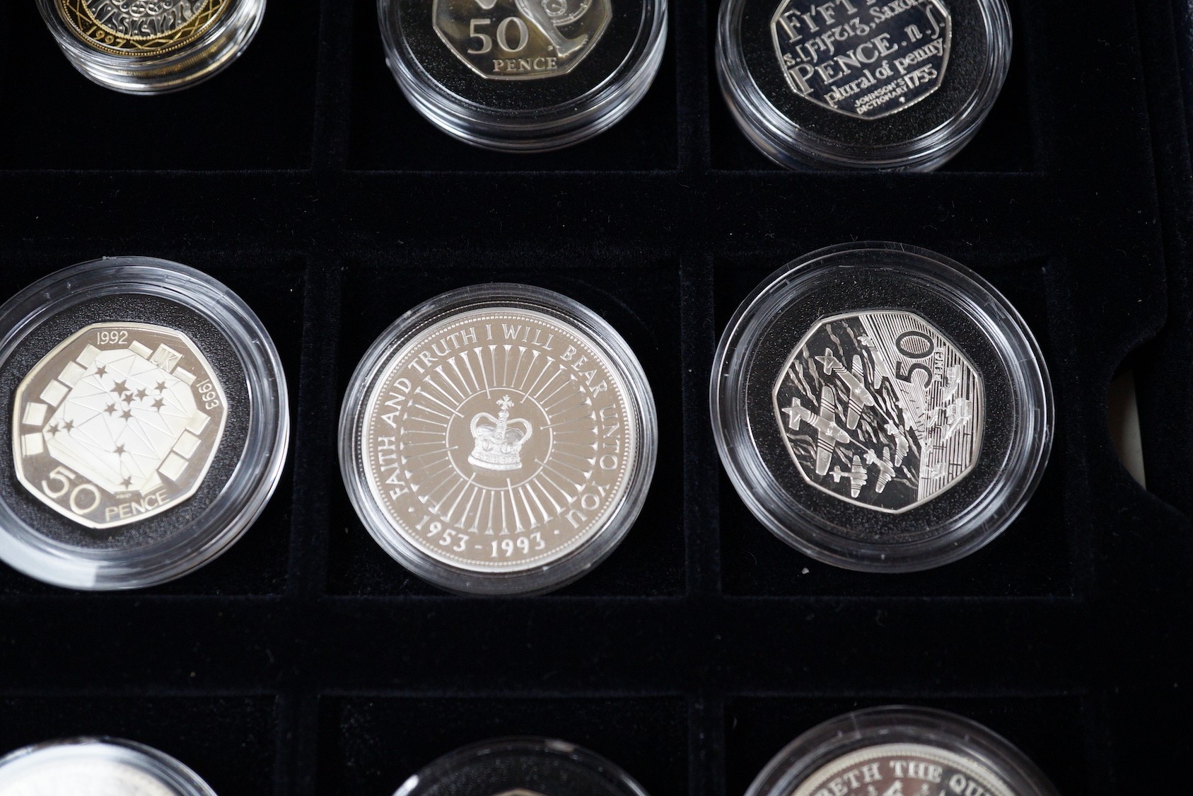 A group of Royal Mint UK commemorative silver proof coins, including 1996 Northern Ireland £1, 1983 royal arms £1, 1995 Welsh £1, 2005 Dictionary 250th anniversary coin, four minute mile 50p, 1997 £2, 50th anniversary D